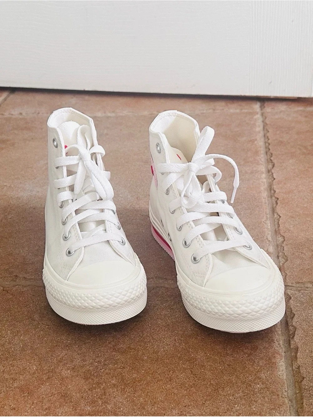 Converse White High-Top Sneakers with Pink Accents